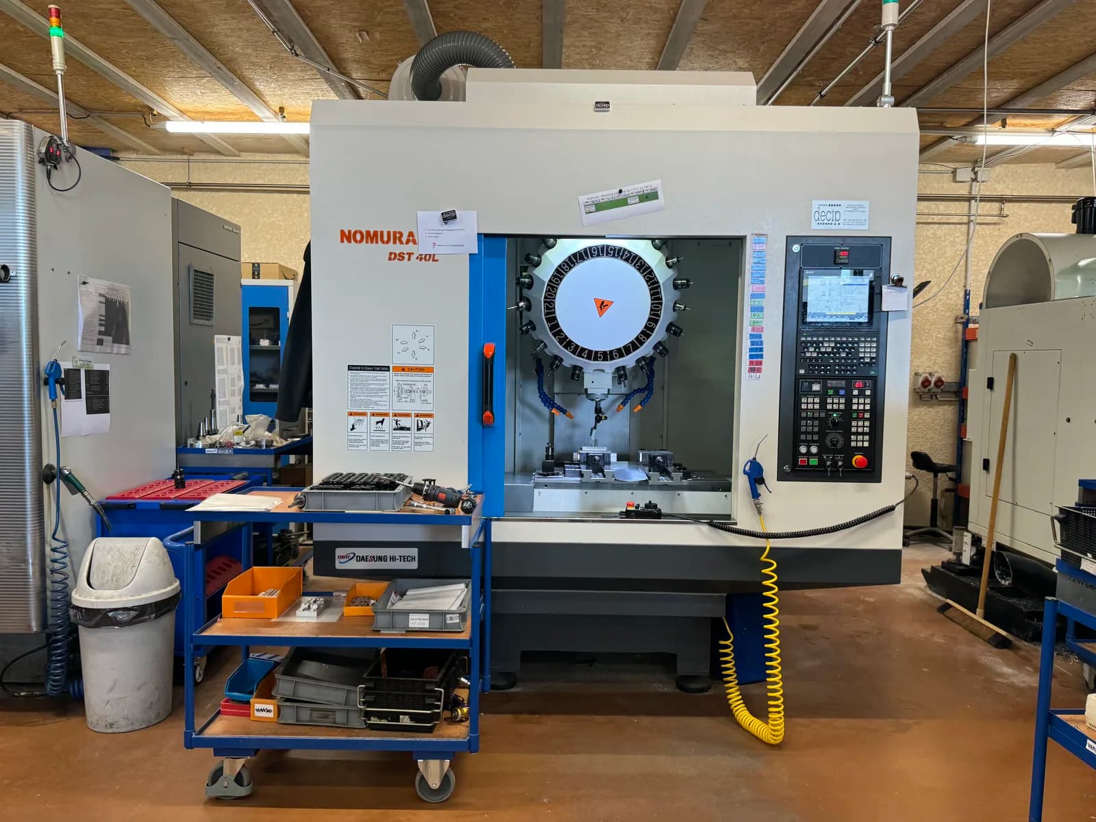Centre d’usinage CNC Nomura DS dans l’atelier CRP